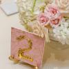 ♥Each table number was done with the print to match the inside of the invitation boxes and various gold keys were used to create the numbers on large ceramic tiles, which stood on gold easels.
-Photo: Tim Otto